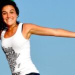 cropped-woman-beach-jump-332278.jpg
